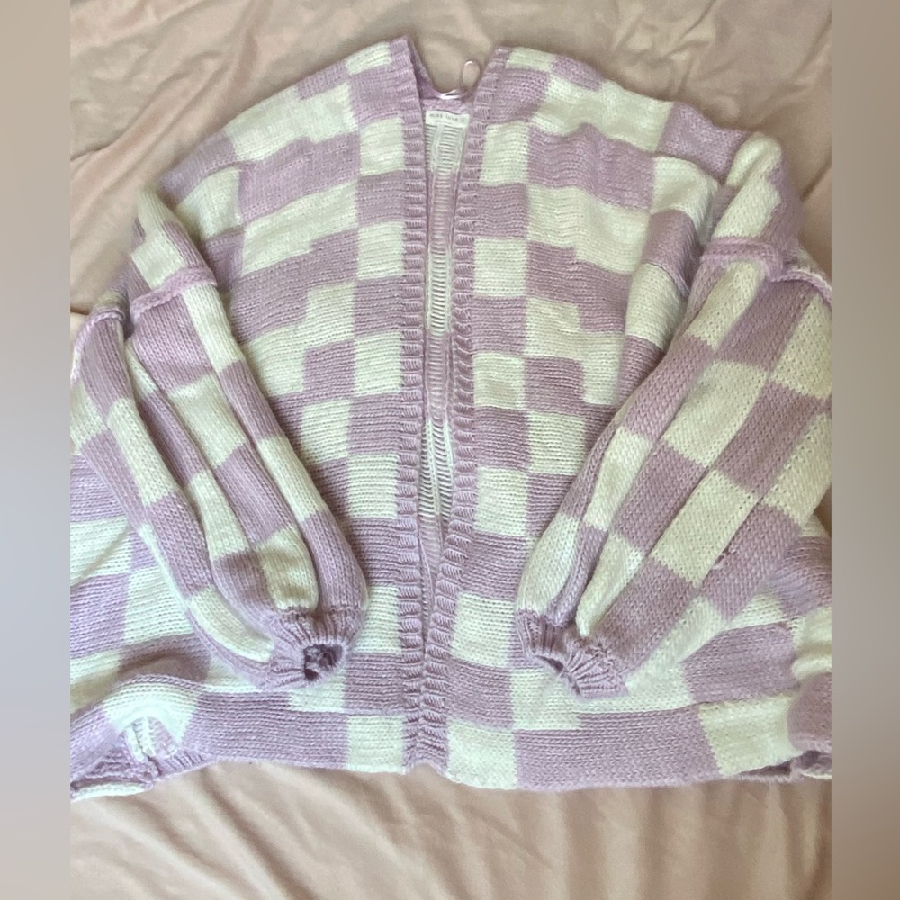over sized purple white checkerd sweater